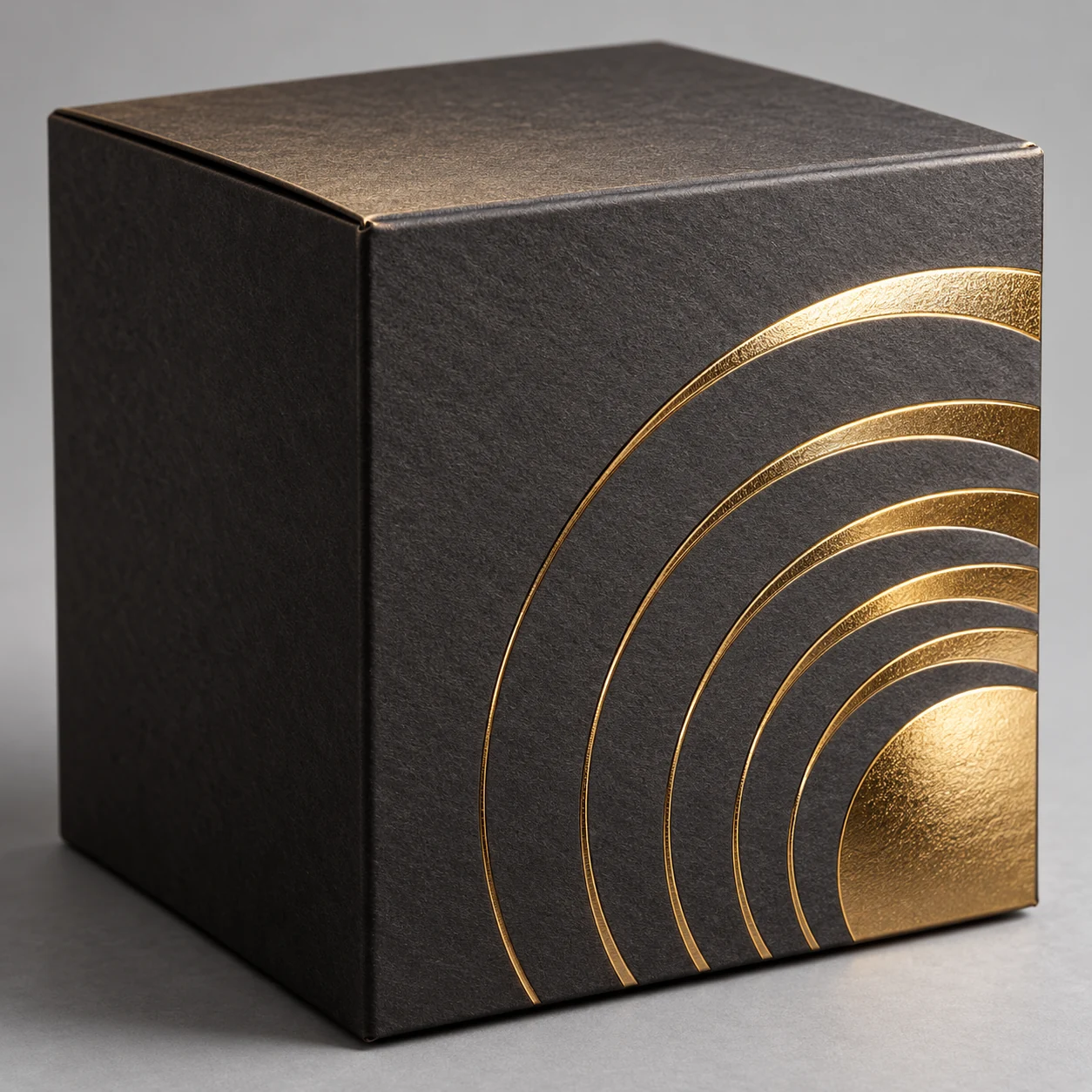 Illustrative concept of metallic gold foil stamping on a paperboard box